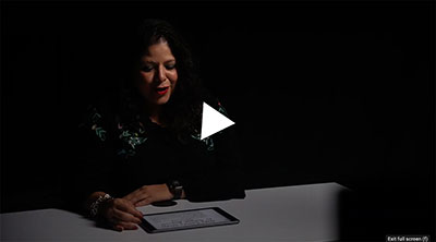 Still image of a videotaped reading by Kaliris Salas Ramirez