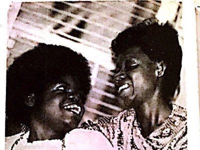 Marguerite Goodman and Willie Mae Goodman sit next to each other. Both are smiling.